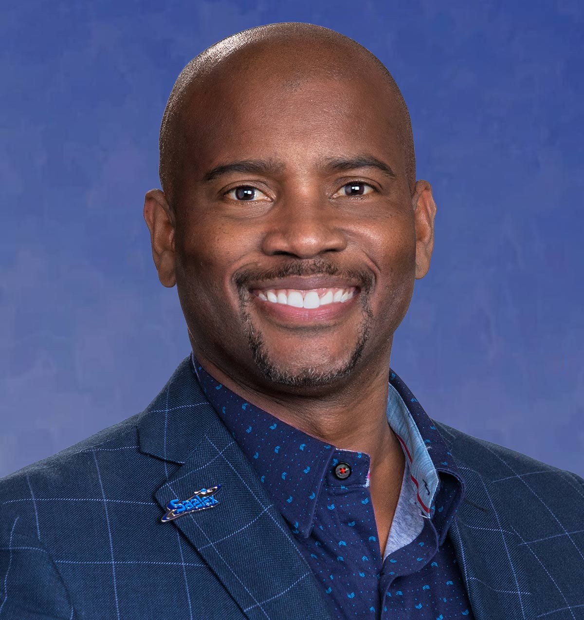 Travis Mack, Chairman and CEO of Saalex Corporation